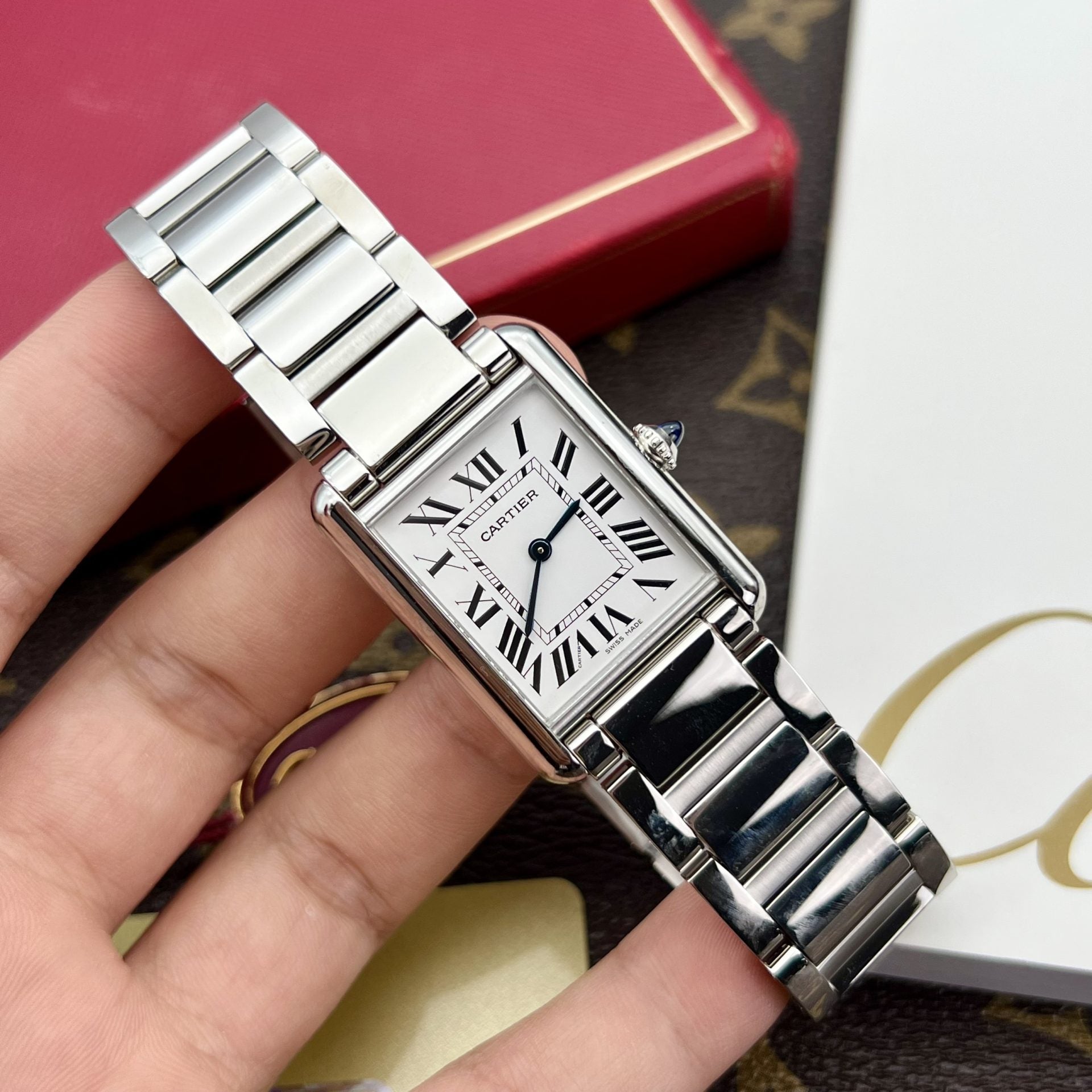 Montre Cartier Tank Must cadran blanc fil métallique 31 x 41 mm
