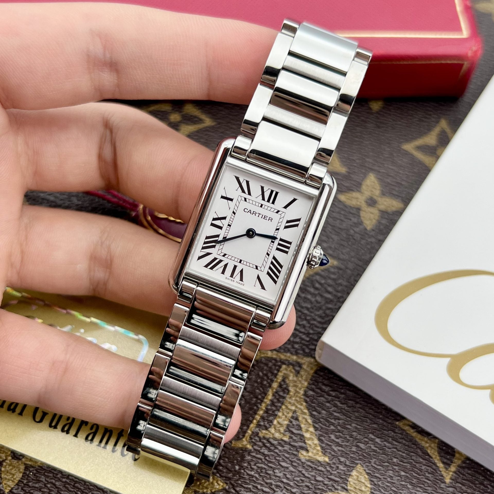 Montre Cartier Tank Must cadran blanc fil métallique 31 x 41 mm