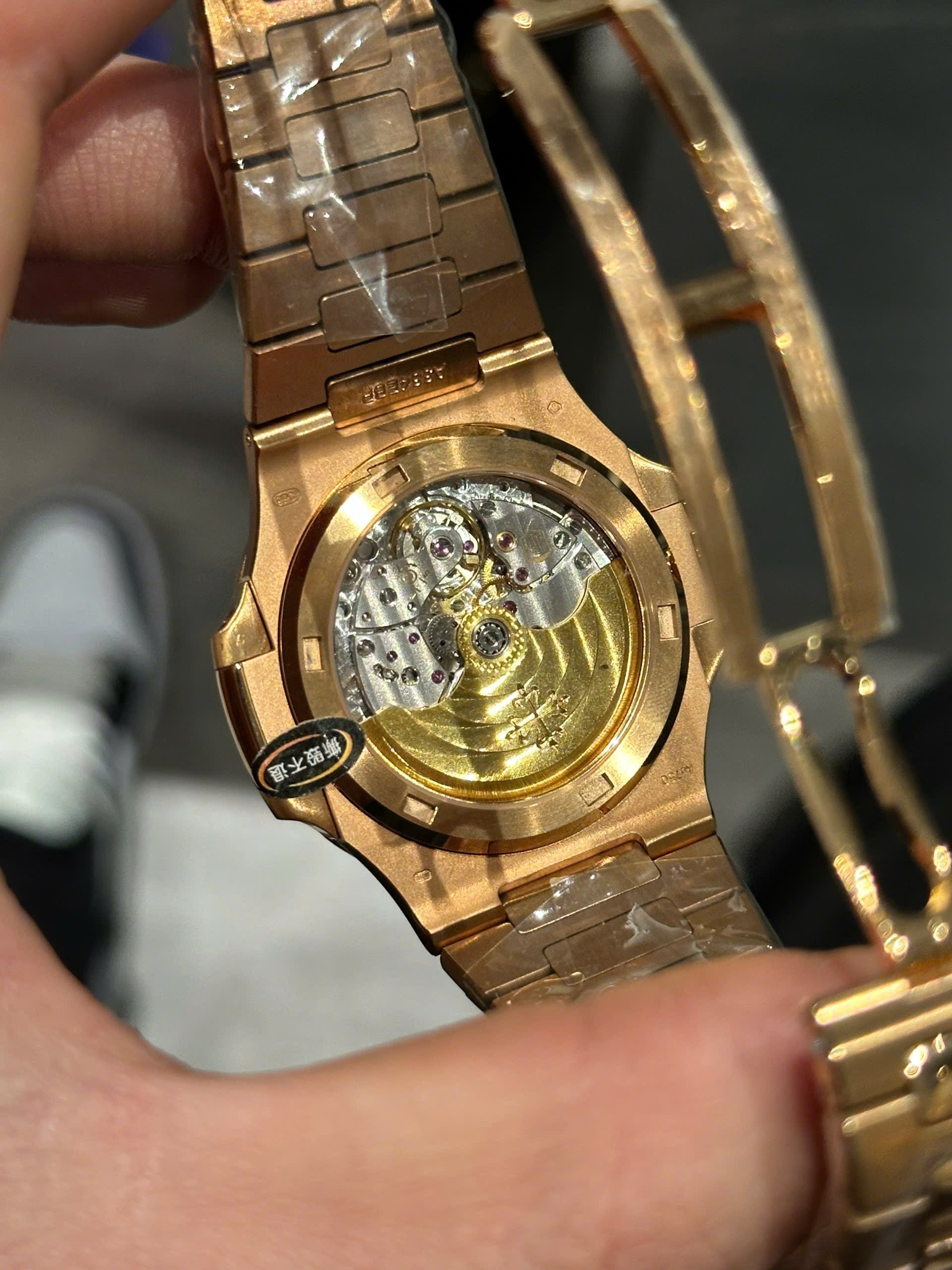 Patek Philippe Nautilus 5711 plaqué or rose, cadran chocolat 3K, usine
